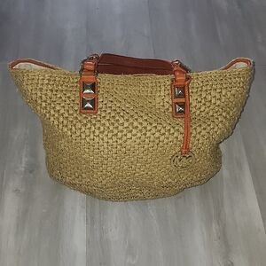MICHAEL Michael Kors Santorini raffia and leather basket tote bag.
